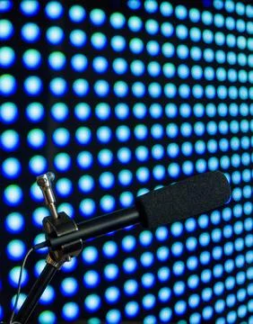 Podcast microphone on colored background with copy space. mic in studio. Micr Stock Photos