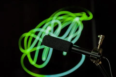 Podcast microphone on colored background with copy space. mic in studio. Micr Stock Photos