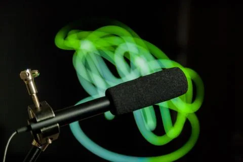 Podcast microphone on colored background with copy space. mic in studio. Micr Stock Photos