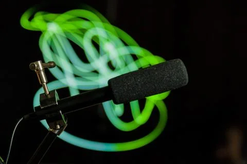 Podcast microphone on colored background with copy space. mic in studio. Micr Stock Photos