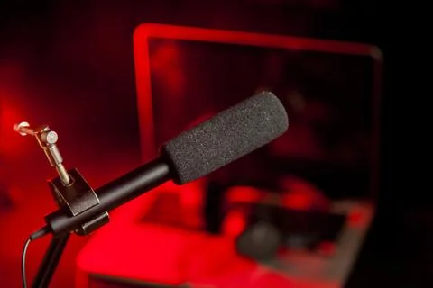 Podcast microphone on colored background with copy space. mic in studio. Micr Stock Photos