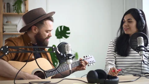 Podcast programme recording jazz singer plays guitar Spbd Video stock 156876225