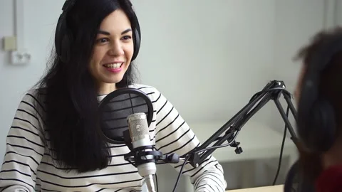 Podcast programme recording long haired woman talks to guest Spbd Vidéo 156876196