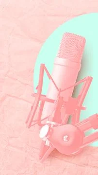 Podcast recording setup with microphone on soft background Stock Photos