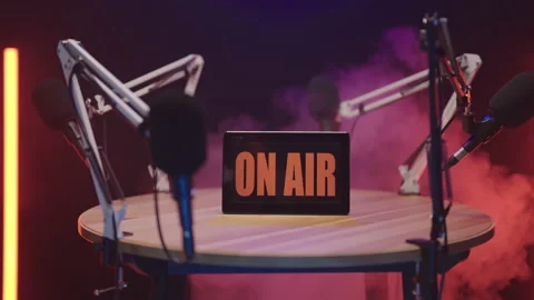 Podcast talk show black studio in smoke blast ON AIR zoom out reveal 4K Stock Footage 219217933