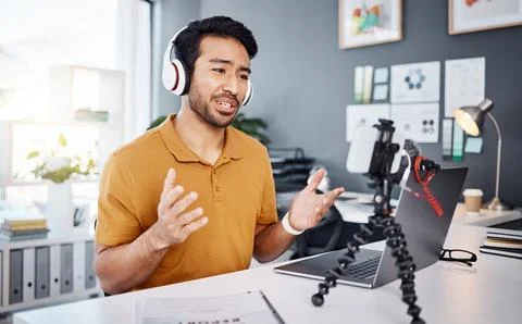 Podcast, tutorial and live stream with a man influencer recording broadcast Foto stock
