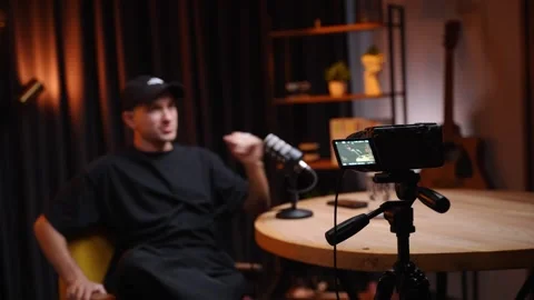 Podcaster gesturing while recording content in studio Stock Footage 318781906