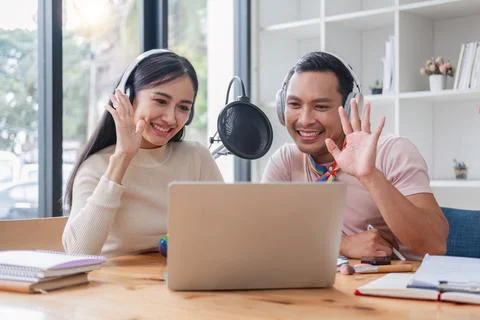 Podcaster Ideas Podcaster is interviewing guests about gender equality and LGBT Stock Photos
