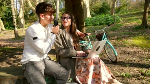 Podcasters recording interviews in nature Stock Footage 303484953