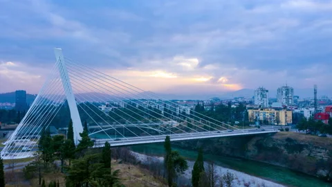 Podgorica Montenegro - Millennium cable stayed bridge over Moraca river at night Stock Footage 135835495