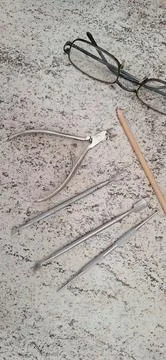 Podiatry tools on granite surface Stock Photos