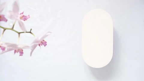 Podium background mockup with water waves and orchid flowers Stock Footage 240913561