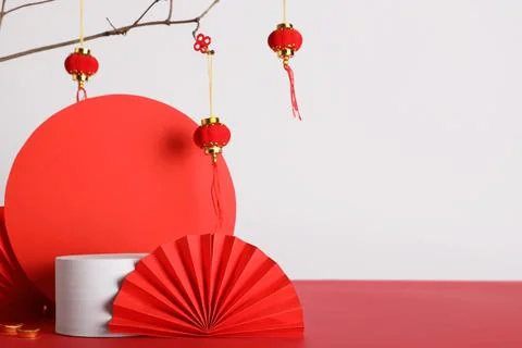 Podium with Chinese decor on light background Stock Photos