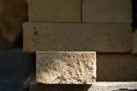 A podium made of rectangular beige stone to demonstrate your product on a stone Stock-Fotos