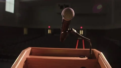 Podium Microphone in empty auditorium Stock Footage 139320929