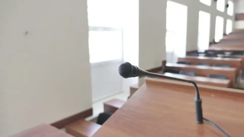 Podium Microphone In Empty University Auditorium, High-School  Classroom Stock Footage 172487635