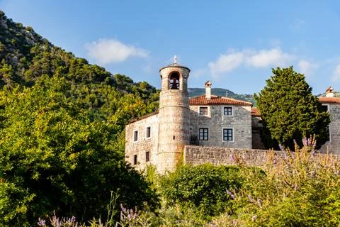 Podmaine Monastery outside of budva by sunlight Stock Photos