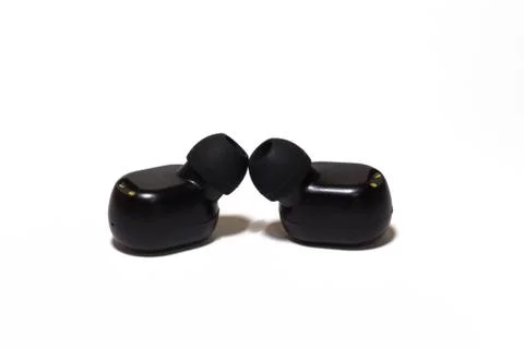 Pods Wireless Bluetooth Headset white background. Stock Photos