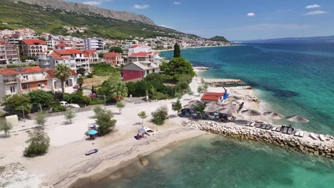 Podstrana Beach Facility, Umbrellas And Coastal Pier, Croatia Stock Footage 342146987
