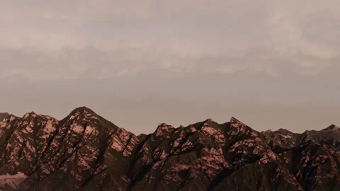 Poetic Mountain Dusk Sky Clouds Expansive Twilight Tracking Left 4K HLG Stock Footage 344013915