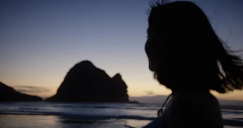 Poha beach with lady at sunset Stock Footage 125390762