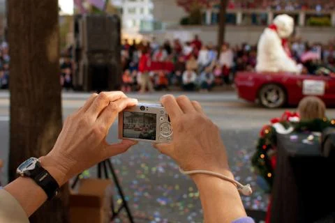 Point and shoot camera captures moments from christmas parade Foto stock