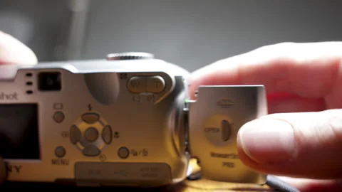 Point and shoot digital camera close up. Old outdated digital camera. 스톡 동영상 260836934