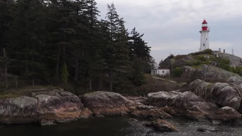 Point Atkinson Lighthouse sits within Lighthouse Park in West Vancouver Stock Footage 333610585