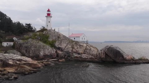 Point Atkinson Lighthouse sits within Lighthouse Park in West Vancouver Stock Footage 333610603