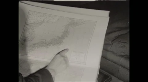Point at Atlas map of Japan Stock Footage 47664237