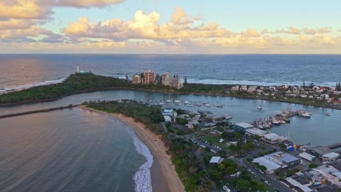 Point Cartwright lighthouse and harbour aerial sunrise, Sunshine Coast Quee.. Stock Footage 333444341