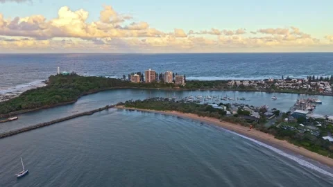 Point Cartwright lighthouse and harbour aerial sunrise, Sunshine Coast Quee.. Video stock 333444362