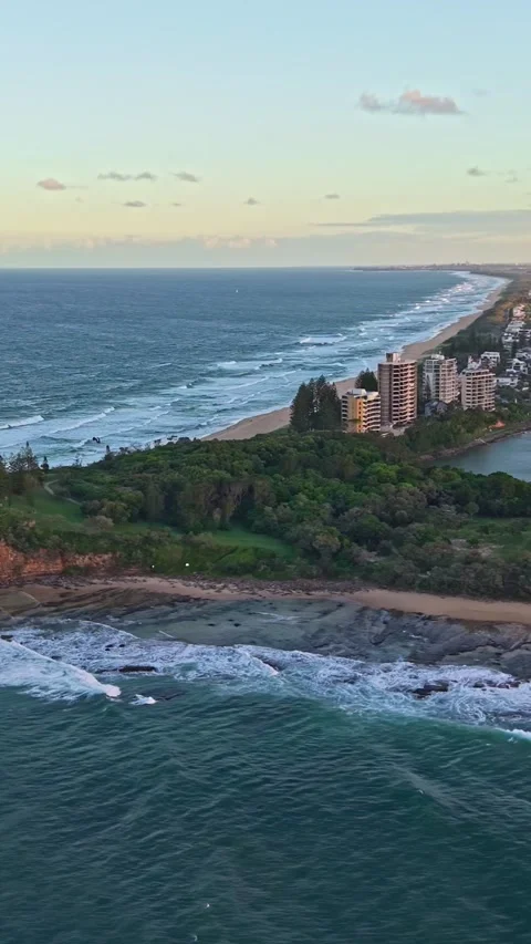 Point Cartwright Lighthouse and Mooloolah River aerial sunset panorama, Sun.. Video stock 334786222