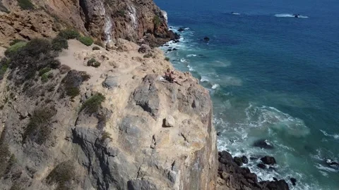 Point Dume two man in the cliff Stock Footage 274040738