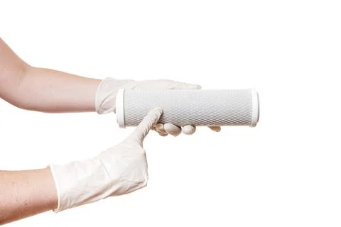 Point finger on cartridge filter for drinking water purification carbon mesh. Stock Photos