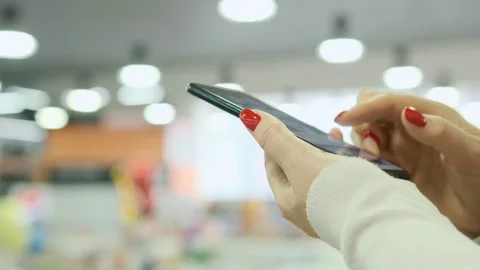 Point finger on mobile phone screen close up, woman sending text message, girl Stock-Footage 200867754