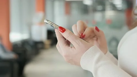 Point finger on mobile phone screen close up, woman sending text message, girl Stock Footage 202203049