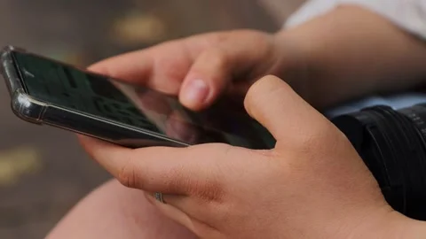 Point finger on screen of mobile phone. Person texting text message, hipste.. Video stock 277443549