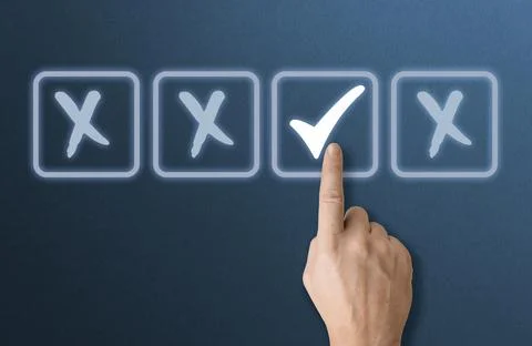 Point with hand to mark correct sign in box for document quality control chec Stock Photos