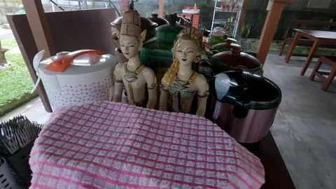 Point of interest shot of traditional Java couple statue in vintage wooden Stock Footage 201275758