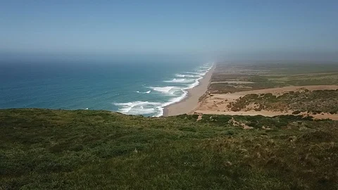 Point Reyes cliffs over beach Stock Footage 89699307