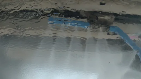 Point of view automatic car wash rinsing off soap, 4k 動画素材 114005112