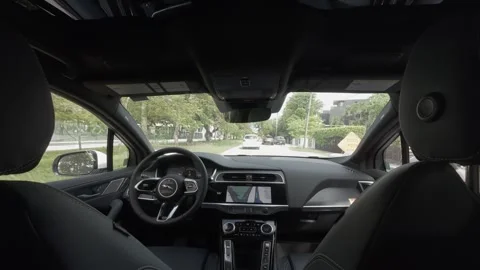Point of view from the back seat of a self driving car using autonomous Stock Footage 336990223