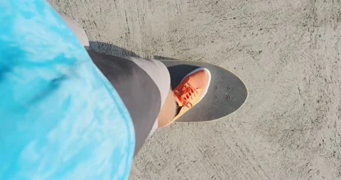 Point of view. Building up speed. Man create speed on skateboard. 動画素材 218451716