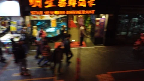 Point of view of a bus rushing through Kowloon, Hong Kong at night. Stock Footage 102813407
