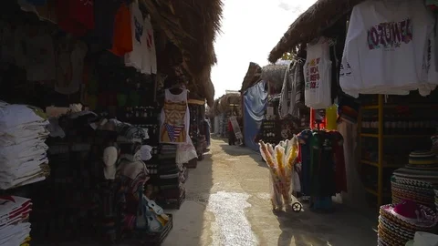 Point of View. The camera moved between the shops in the market of Cozumel Stock Footage 99754078