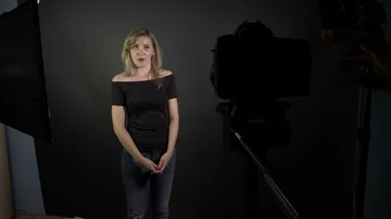 Point of view of cameraman shooting young attractive woman talking to camera  Stock Footage 86137906