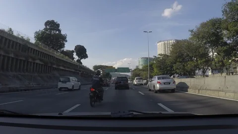 Point Of View from car dashboard driving in traffic on daylight 動画素材 92565743