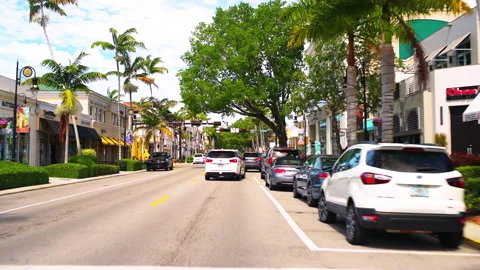 Point of view car driving in downtown shopping mall of Naples, Florida Stock-Footage 218273383