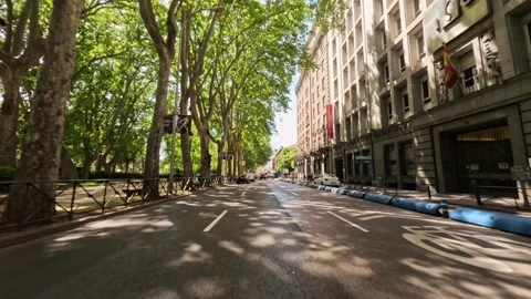 Point of view car driving on Gran Via street of Madrid city center on sunny day 動画素材 254805491
